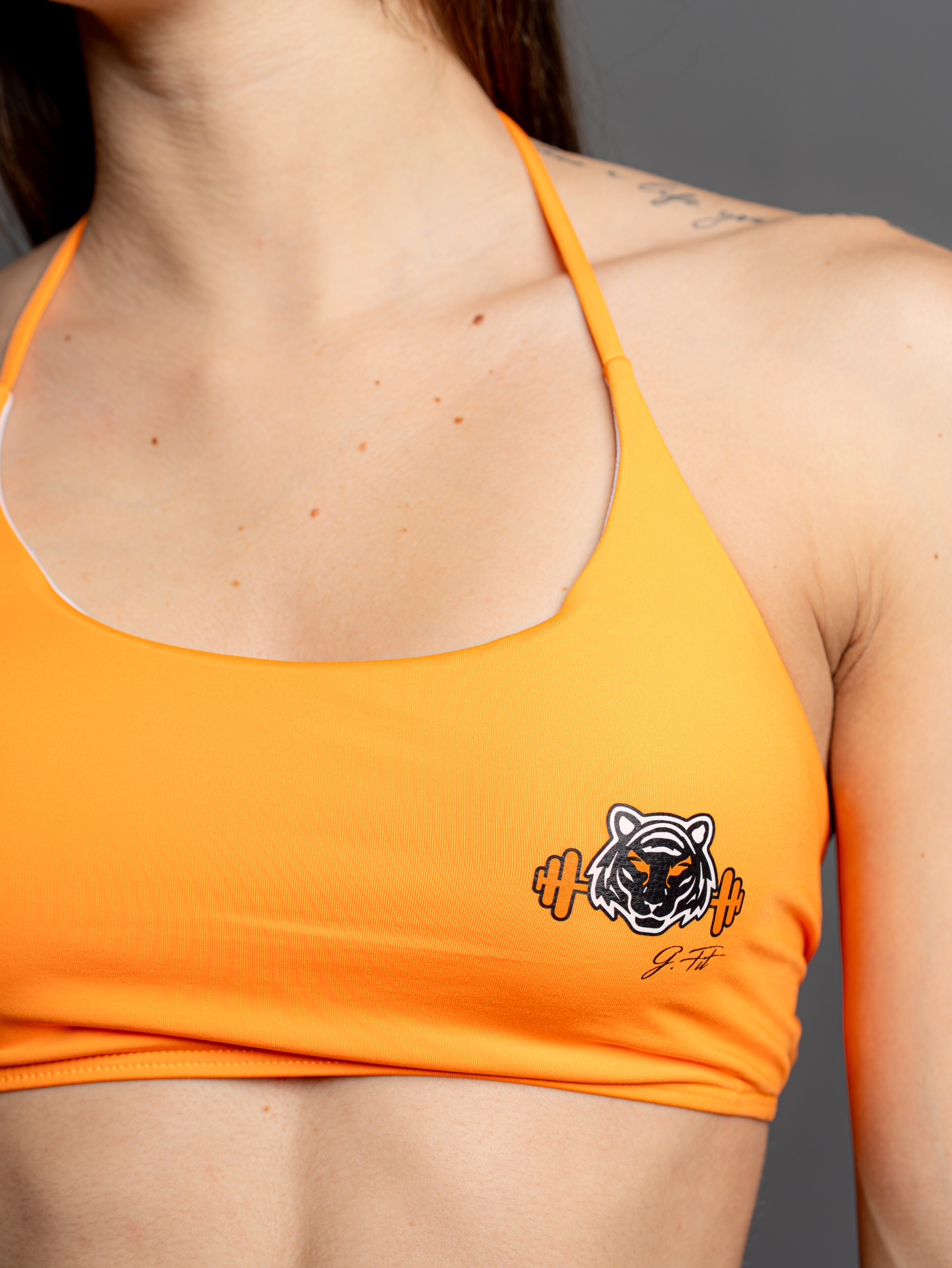 ORANGE TRIBACK TOP